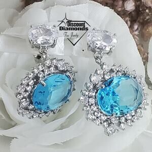 Blue Oval Sapphire and White Baguette Diamond Post Earrings 925 Silver